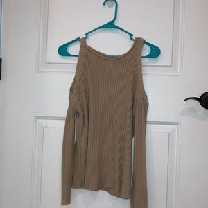 a shoulder less sweater
